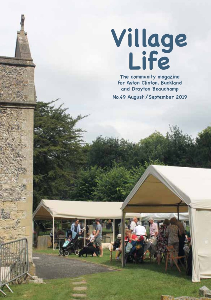 Photo of a church with marquees outside.